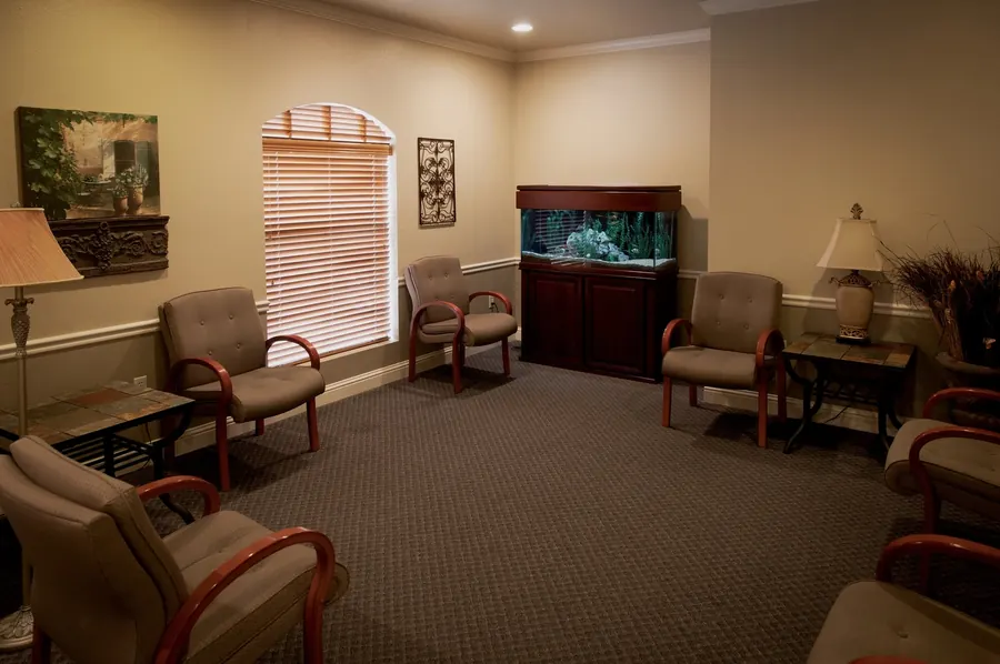 The waiting room at Kerst & Caskey, with armchairs and an aquarium.